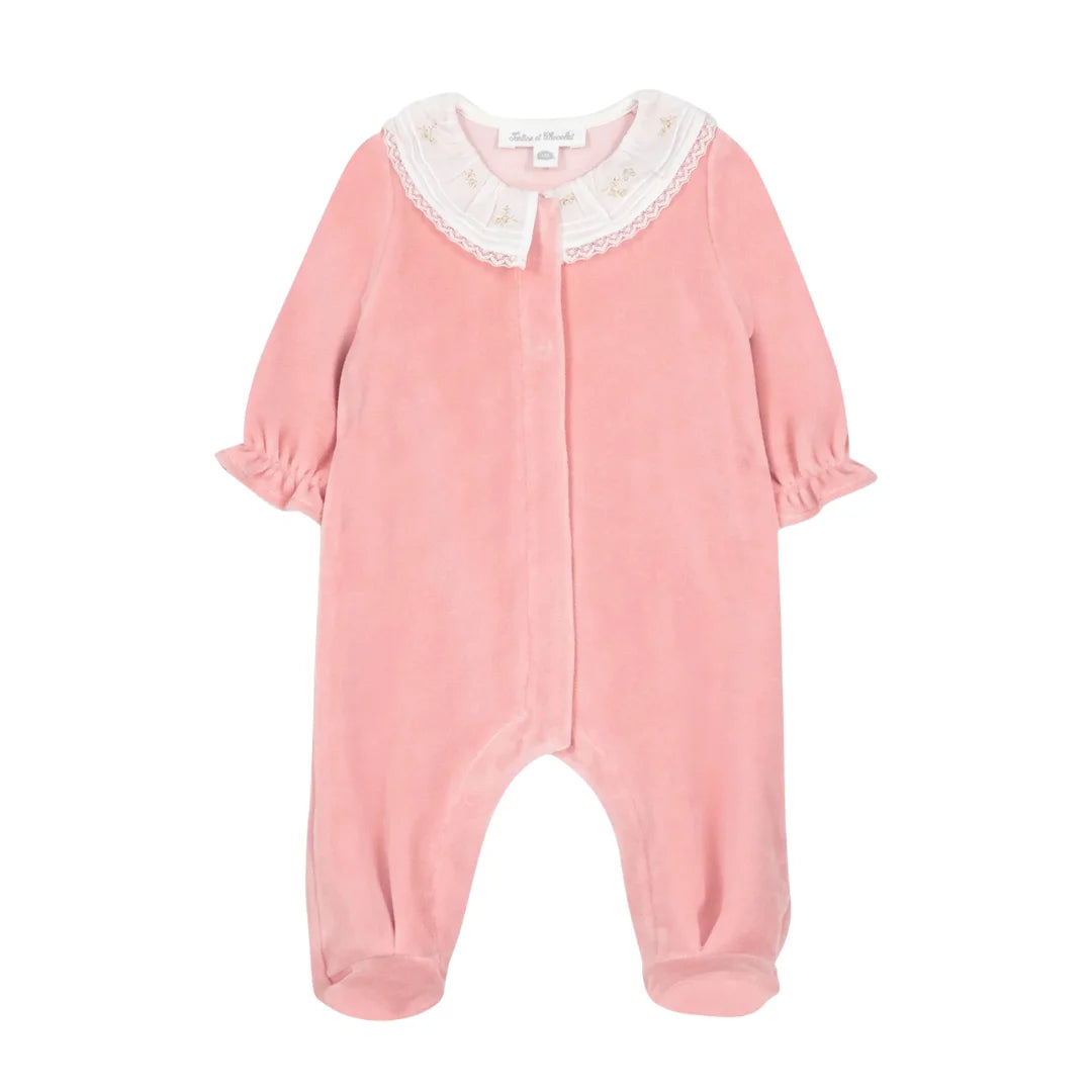 A front view of the Tartine et Chocolat peach baby footie with a velvet ruffled collar.