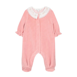 A front view of the Tartine et Chocolat peach baby footie with a velvet ruffled collar.