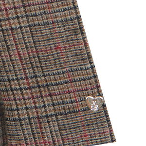 A high-resolution close-up of the velvet fabric texture, star details, and puffed sleeves.