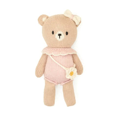 A flat-lay view of the Tuntun baby bear with purse in pink 8 inches.