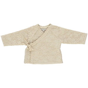 Beige knitted baby cardigan on a white background