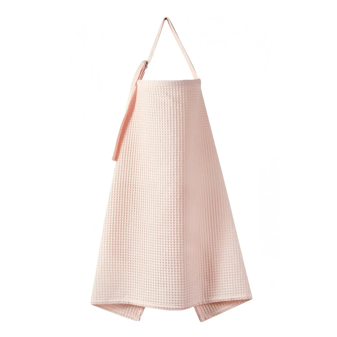 A front view of the petal pink and waffle cotton nursing cover.
